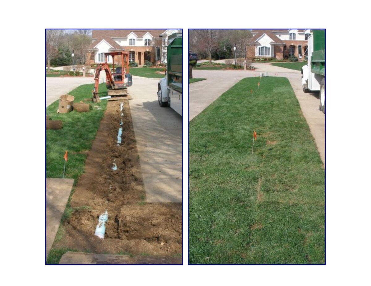 Sod being installed next to a drive way